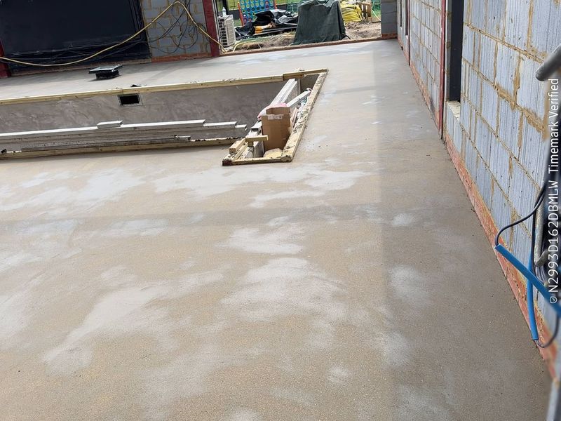 Commercial unit, service pit — floor screeding by Johal Screeding Ltd